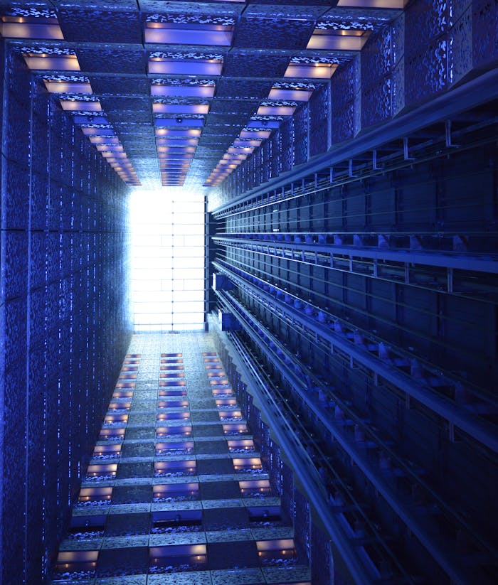 Perspective view of high narrow atrium at building of Fairmont hotel Nanjing in daytime